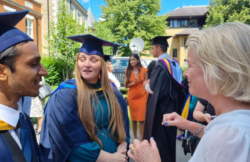 Vicky with 2 graduates